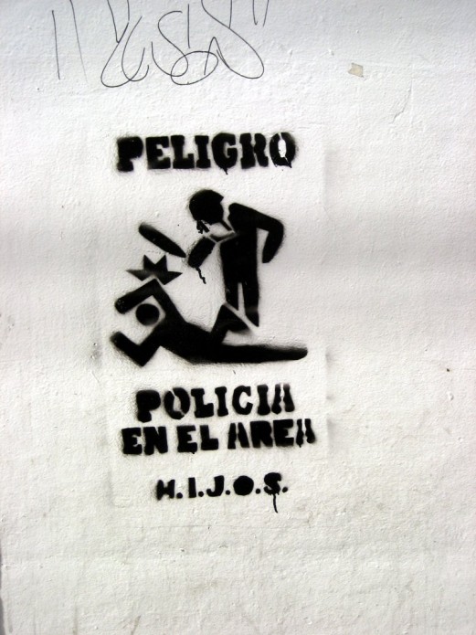 Stencil Graffiti - Peligro, policia en el área Stencil Graffiti - Peligro, policia en el área