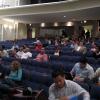 Primeros asistentes a la conferencia